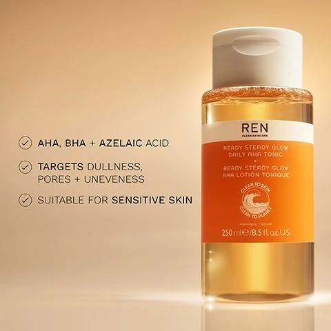 Image 1 - A bottle of REN Clean Skincare Ready Steady Glow Daily AHA Tonic with a light orange label and a white cap, featuring text that includes AHA, BHA + Azelaic Acid, targets dullness, pores + unevenness, suitable for sensitive skin, and 250 ml/8.5 fl. oz. U.S.
Image 2 - A side-by-side comparison of a womans face before and immediately after a cosmetic procedure, with BEFORE on the left and IMMEDIATELY AFTER on the right.
Image 3 - A graphic titled BIOACTIVES features three sections highlighting skin care ingredients: AHA from lactic acid with the text helps eliminate dead skin cells, BHA from salicylic acid with the text helps tighten the appearance of pores, and azelaic acid precursors with the text boosts radiance and evens skin tone, accompanied by images of bamboo, wood, and olives.
Image 4 - A young woman with blonde hair is smiling while holding a bottle of REN Ready Steady Glow Daily AHA Tonic, and the image features the text 100% SHOWED BRIGHTER SKIN + TIGHTER PORES* along with other product details.
Image 5 - A bottle of REN Ready Steady Glow Daily AHA Tonic is displayed inside a glass dome with a beige background, accompanied by text stating CLINICALLY PROVEN TO: INSTANTLY BRIGHTEN SKIN* TIGHTEN PORES* VISIBLY REDUCE HYPERPIGMENTATION* *Clinical study on 50 volunteers.
Image 6 - Image shows a collection of REN skincare products arranged against a soft, warm background. The products include a green cleansing gel, a yellow tonic, a white eye cream, and an orange moisturizer, with the words CLEANSE, EXFOLIATE, EYE SUPPORT, and MOISTURISE displayed around them.