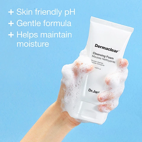 Image 1 - A hand holding a bottle of Dermaclear Cleansing Foam, surrounded by foam, against a light blue background with text that reads Skin friendly pH, Gentle formula, Helps maintain moisture.
Image 2 - Three tubes of Dr. Jart+ Dermaclear pH Foam Cleanser are arranged in a wire basket, with a white towel beneath them and the text Formulated with Glycerin in the top right corner.